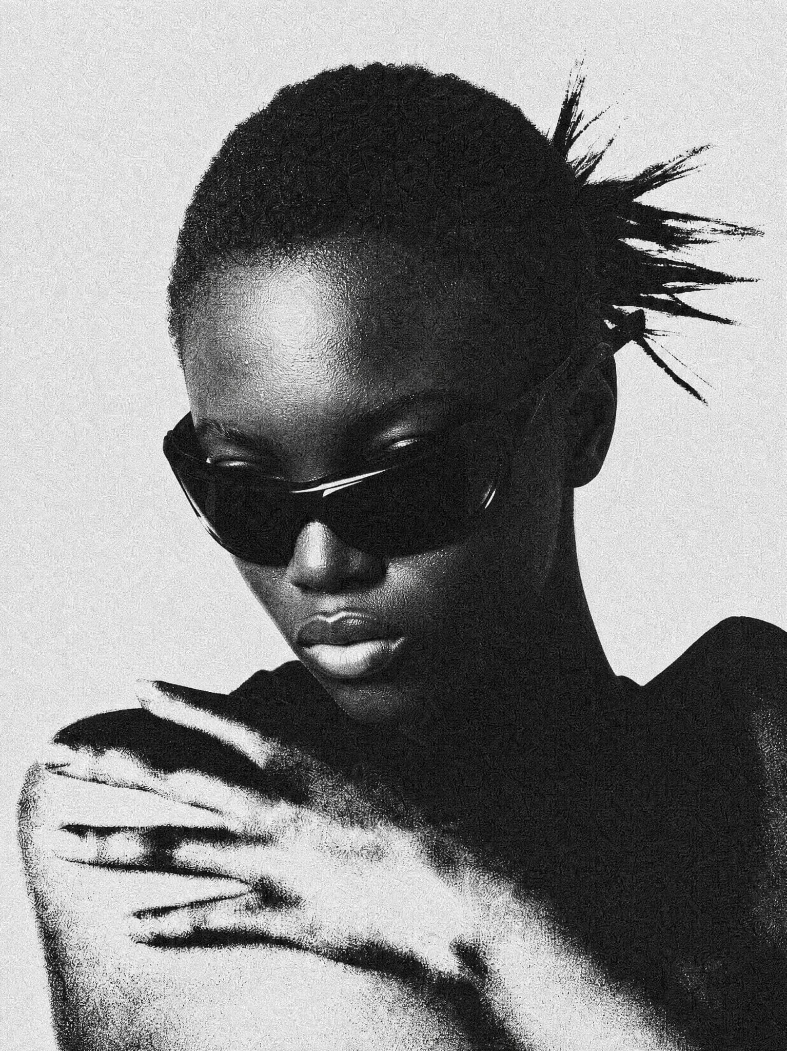 Black-and-white portrait wearing dark sunglasses